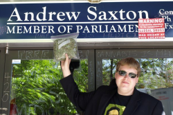 'Free Marc' organizer Jacob Hunter protesting outside Conservative MP Andrew Saxton's office in North Vancouver. (Photo by Jeremiah Vandermeer - click to enlarge)